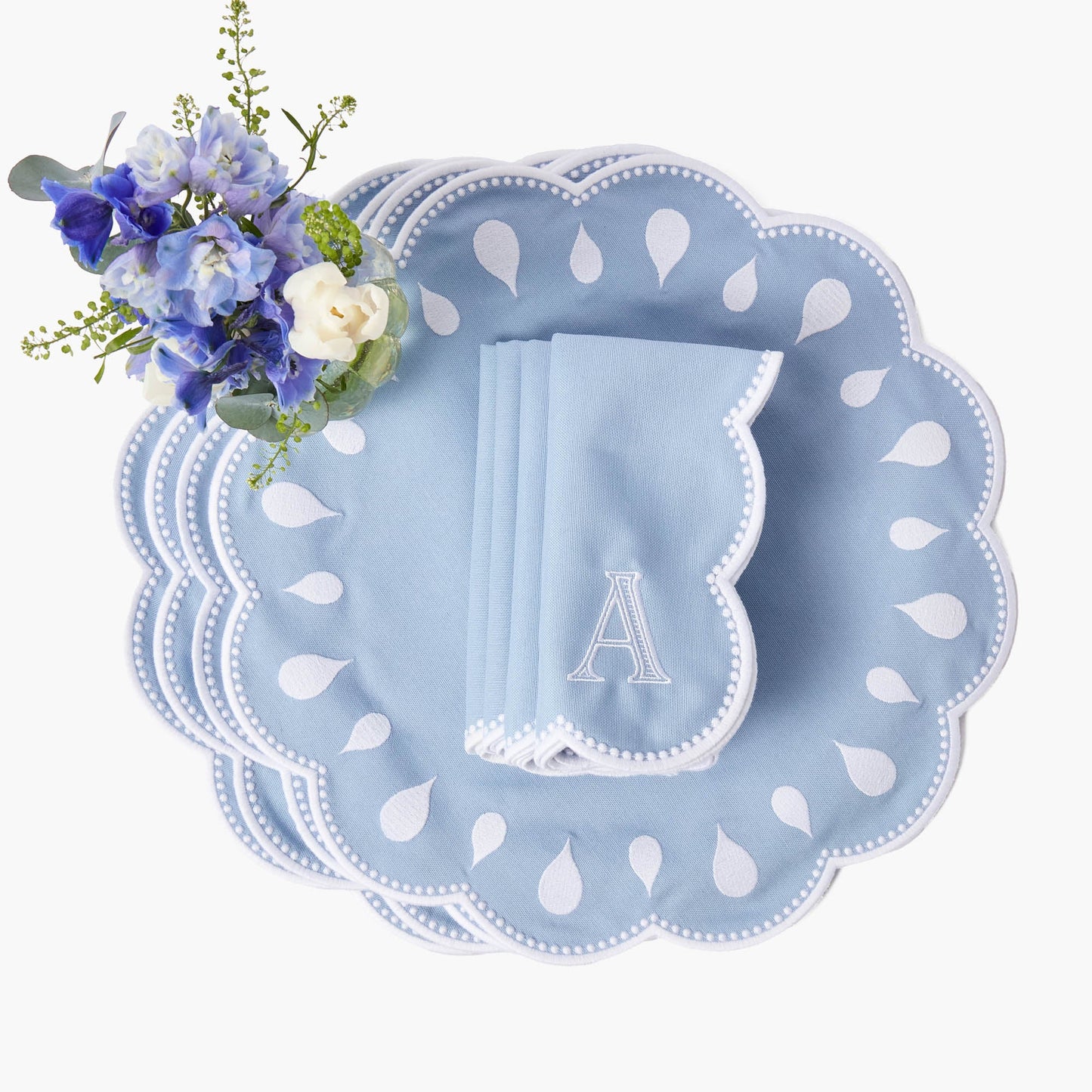 Tovagliette e tovaglioli Bettina blu e bianchi (set da 4)