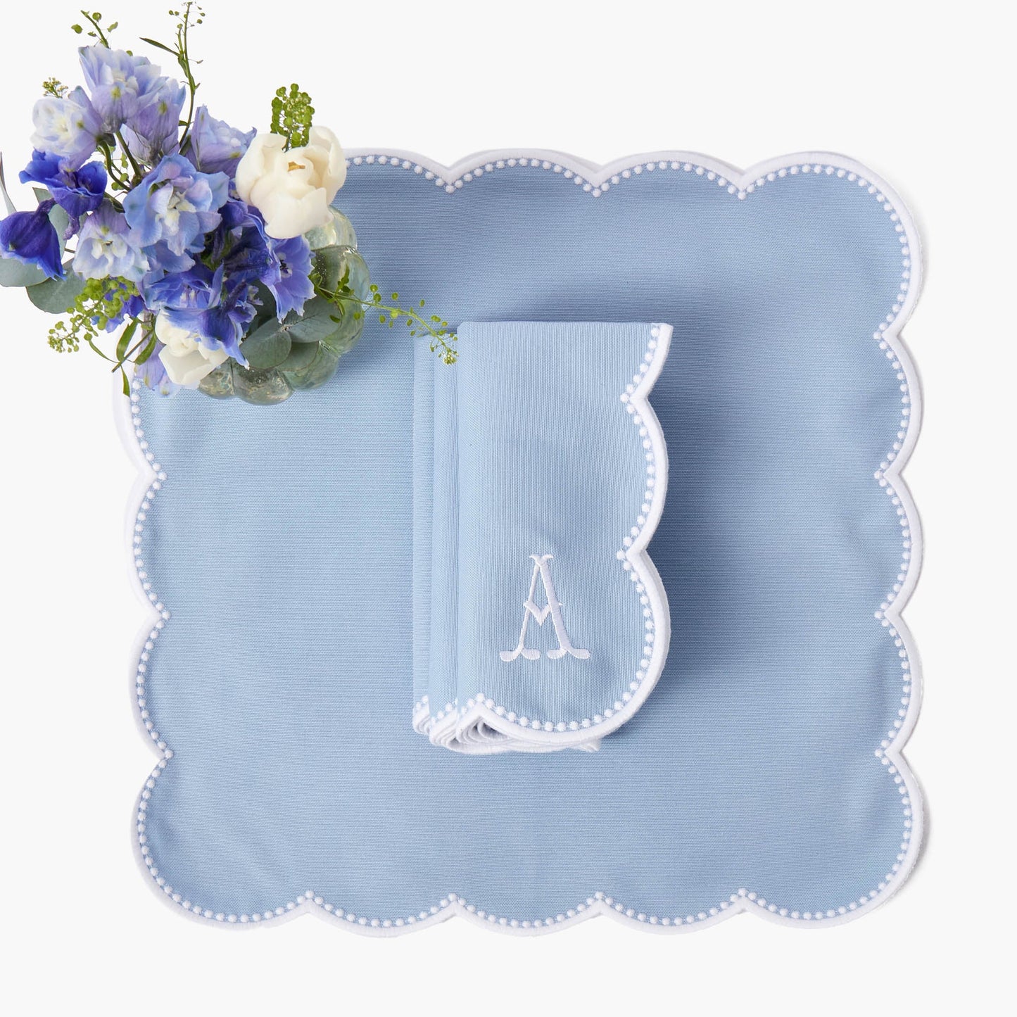 Tovagliette e tovaglioli Bettina blu e bianchi (set da 4)
