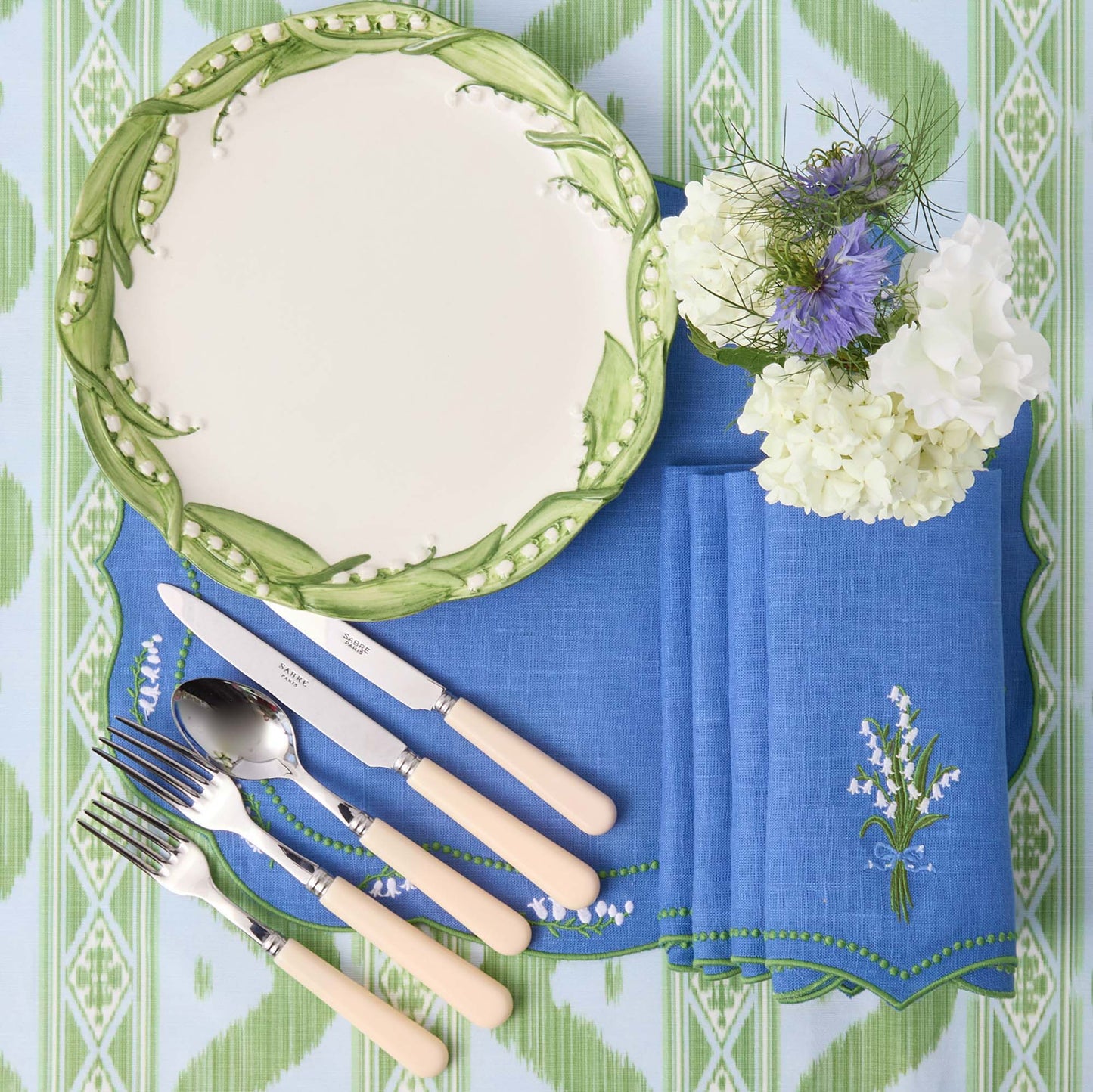 Tovagliette e tovaglioli in lino blu Lily of the Valley (set da 4)