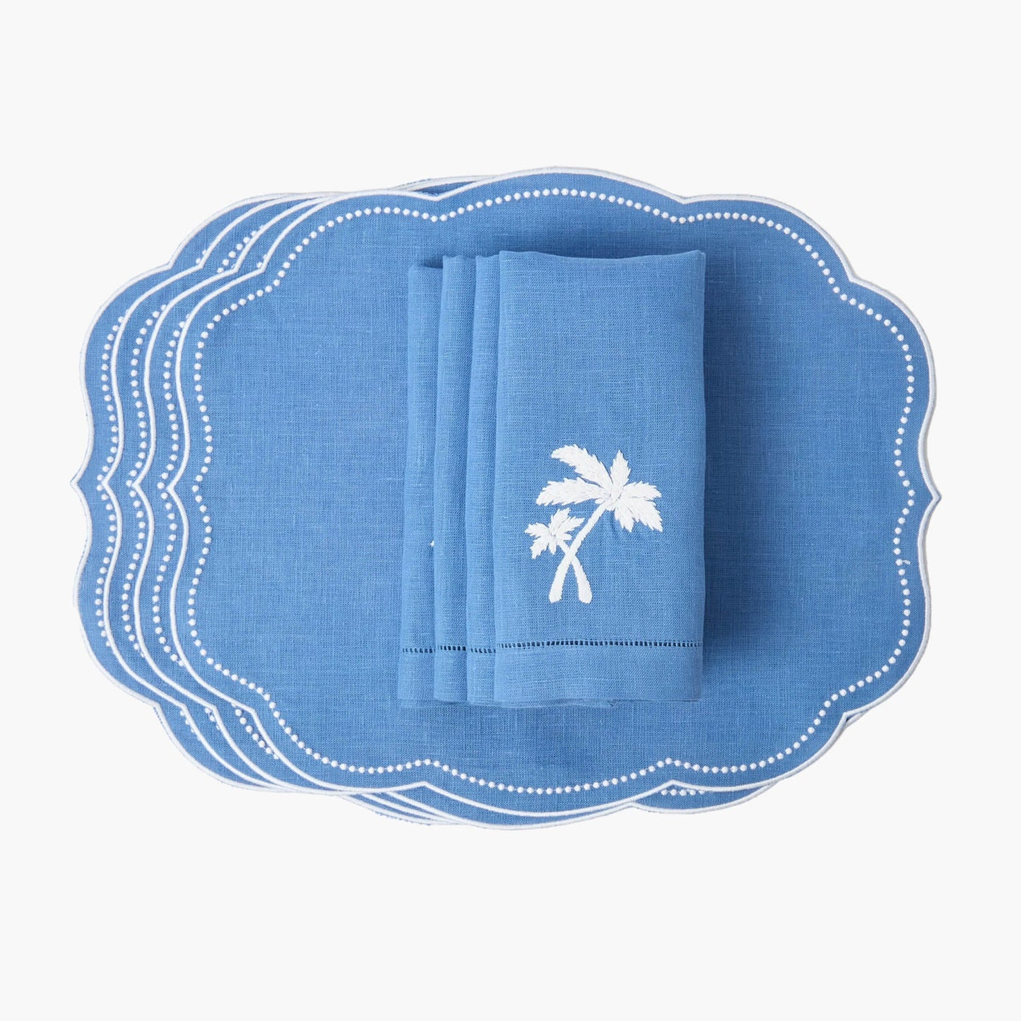 Tovagliette all'americana in lino blu Eloise e tovaglioli con palme (set da 4)